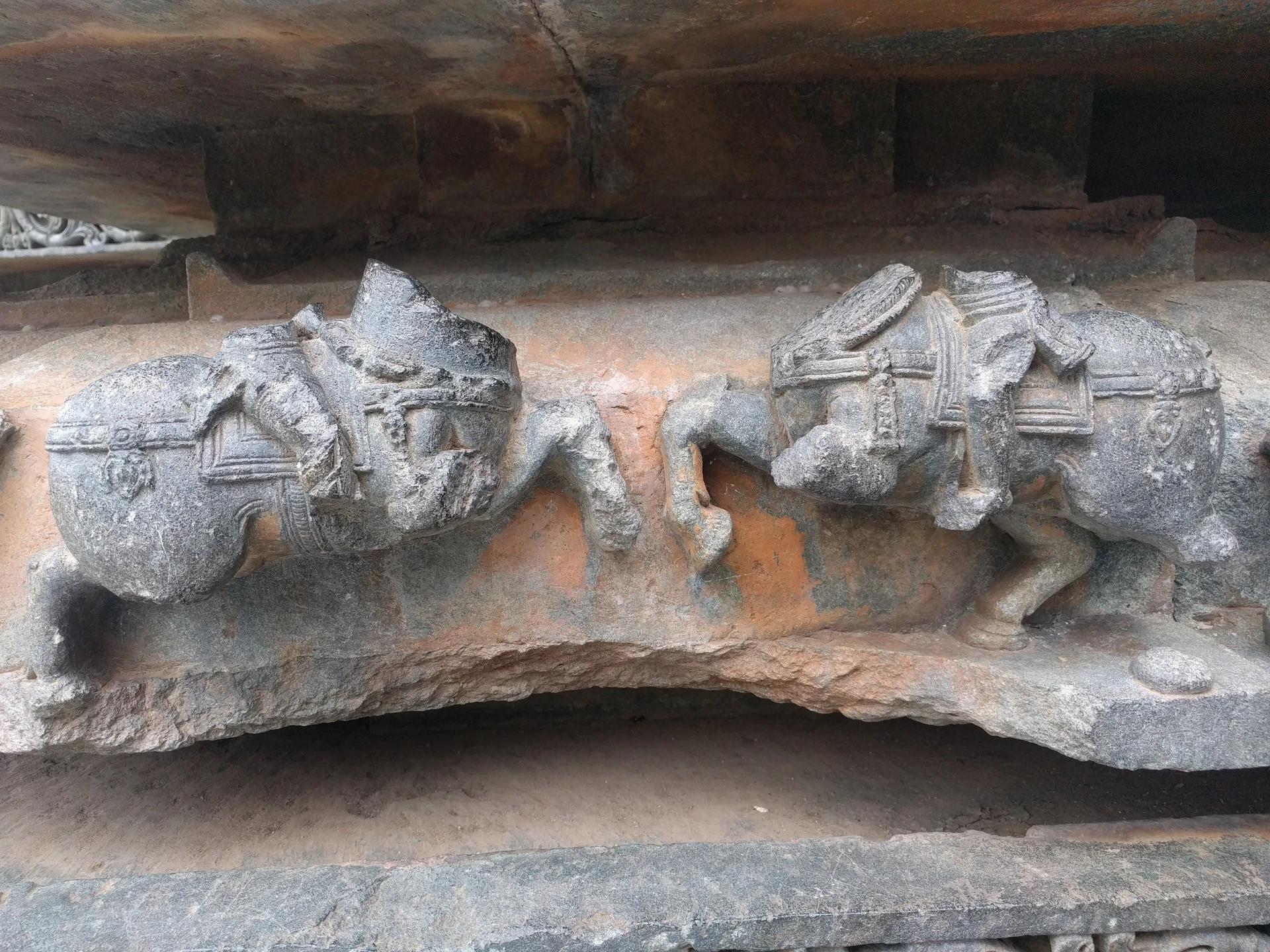 Beauty in ruins — damaged cavalry frieze at Hoysaleswara Temple, scars of 14th-century invasions