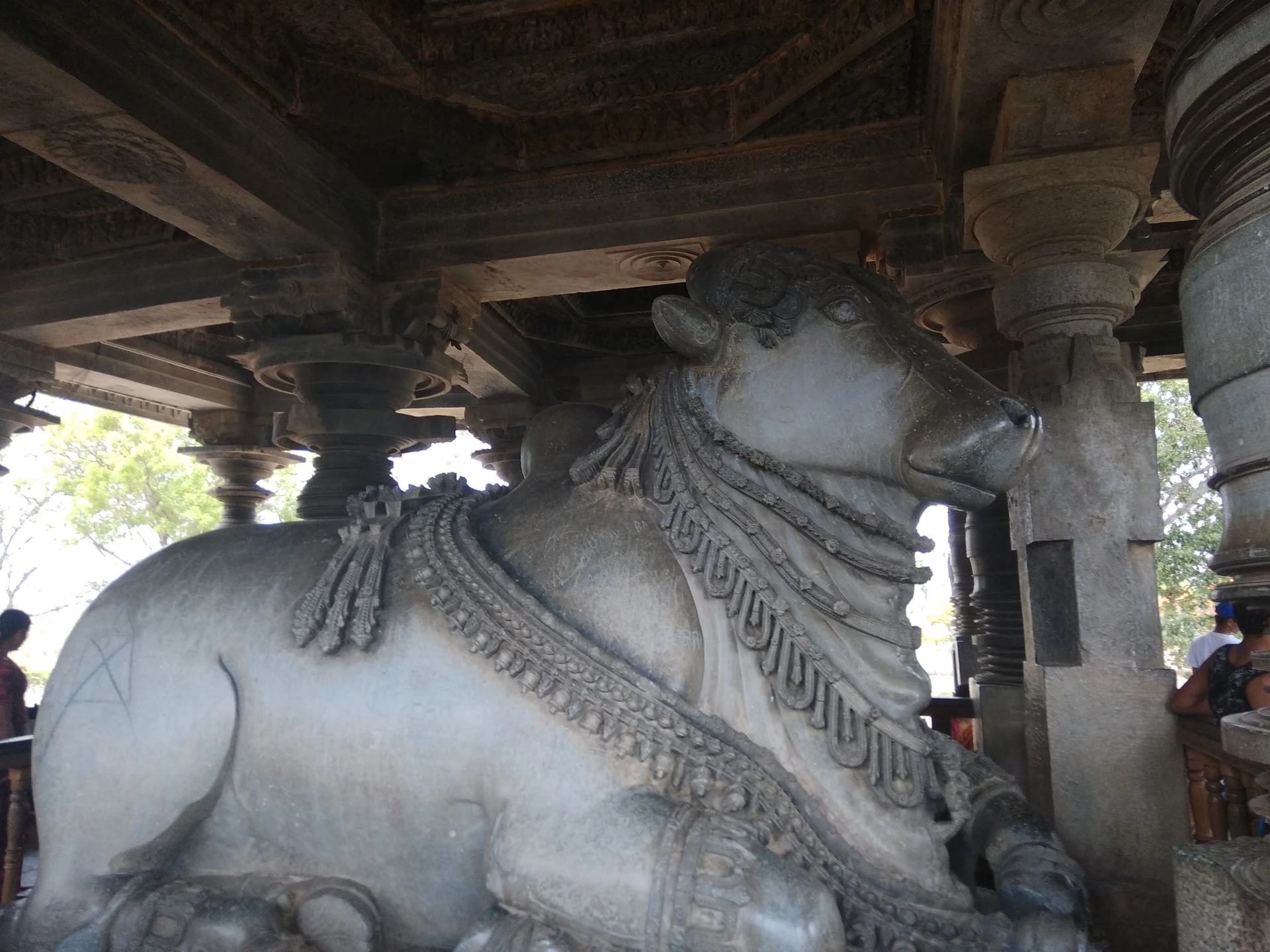 Hoysaleswara Temple interior mandapa with lathe-turned pillars and carved ceiling