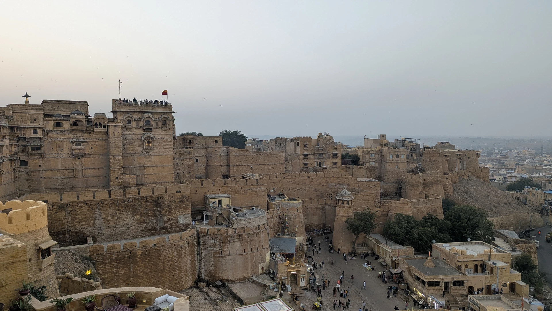 Street life at Main Chowk inside Jaisalmer Fort during the day, vendors and visitors