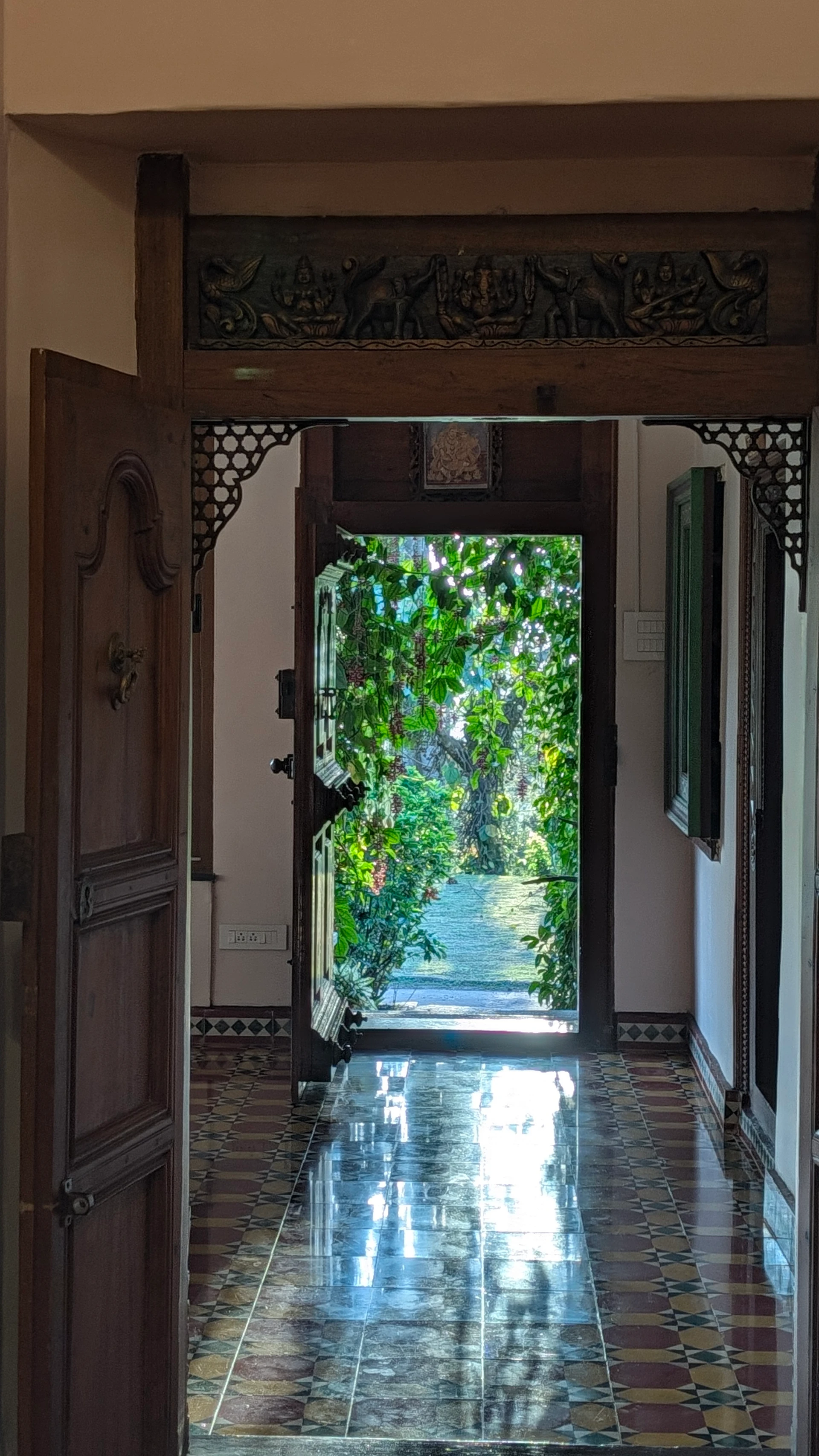 Corridor at Woodway Estate with evening light and greenery outside